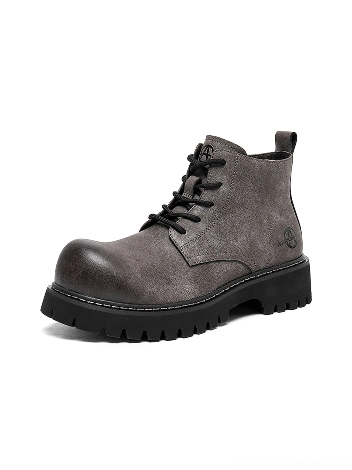 Tan distressed streetwear boots with secure laces, padded collar, and deep utility tread