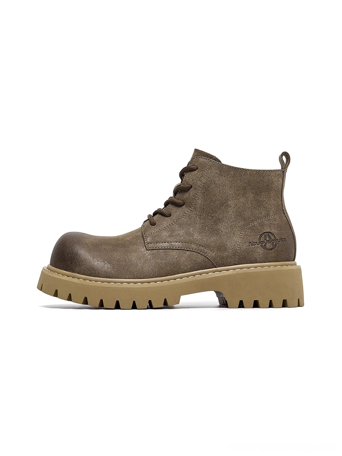 Tan distressed workwear boots with lace-up closure, rounded front, and textured outsole for streetwear
