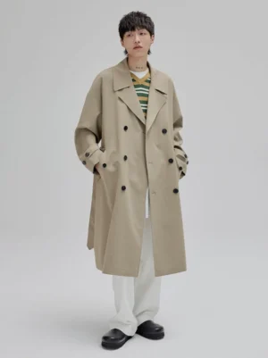 Full front view of a tan Korean streetwear trench coat with straight long silhouette, double-breasted button closure, and relaxed oversized fit