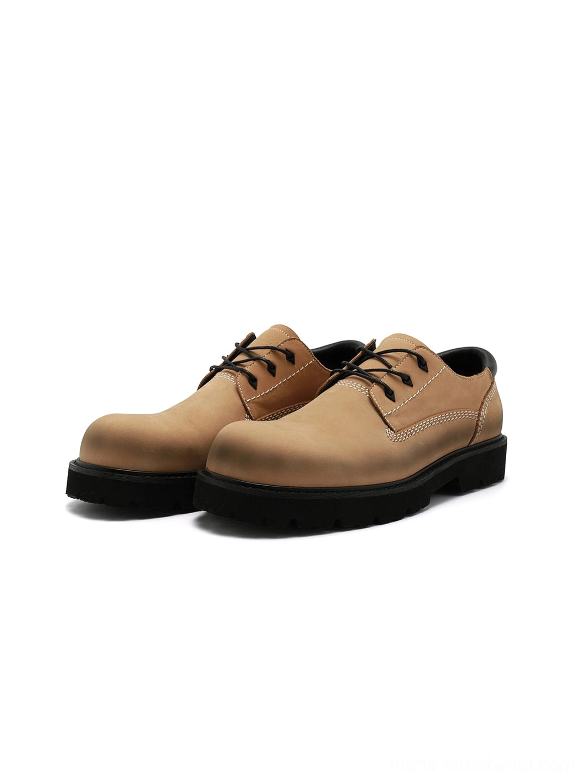 Tan leather lug-sole derby shoes product image highlighting the rounded toe, lace-up front, and thick black rubber sole