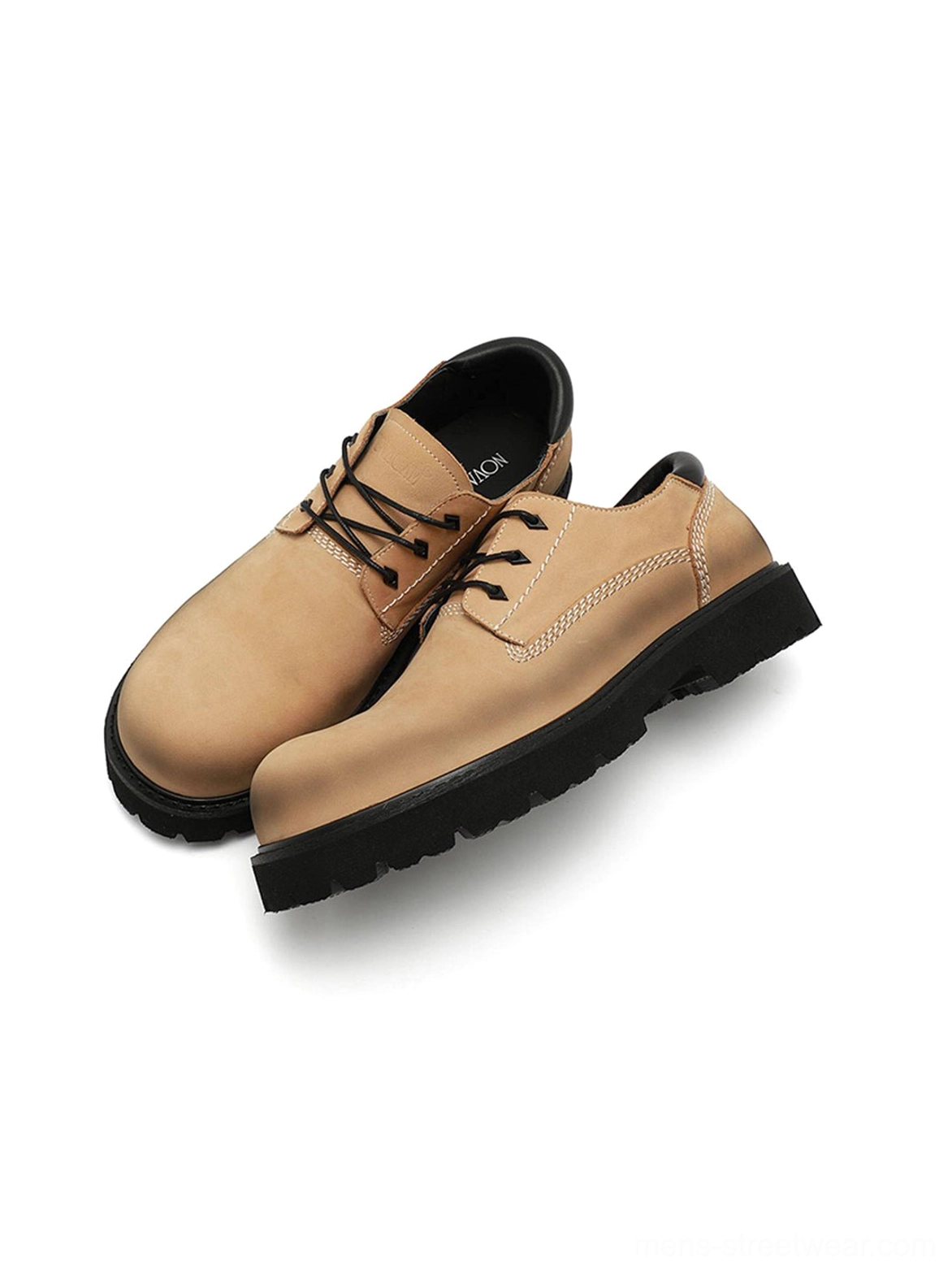 Tan leather lug-sole shoes featuring a clean round toe, structured upper, and durable workwear-inspired outsole