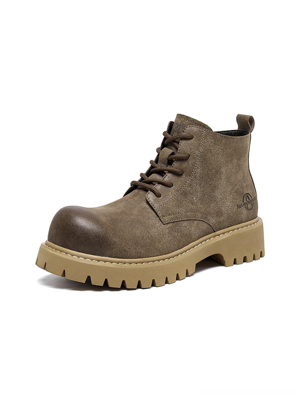 Tan lug-sole ankle boots with substantial silhouette and distressed texture for fall streetwear outfits
