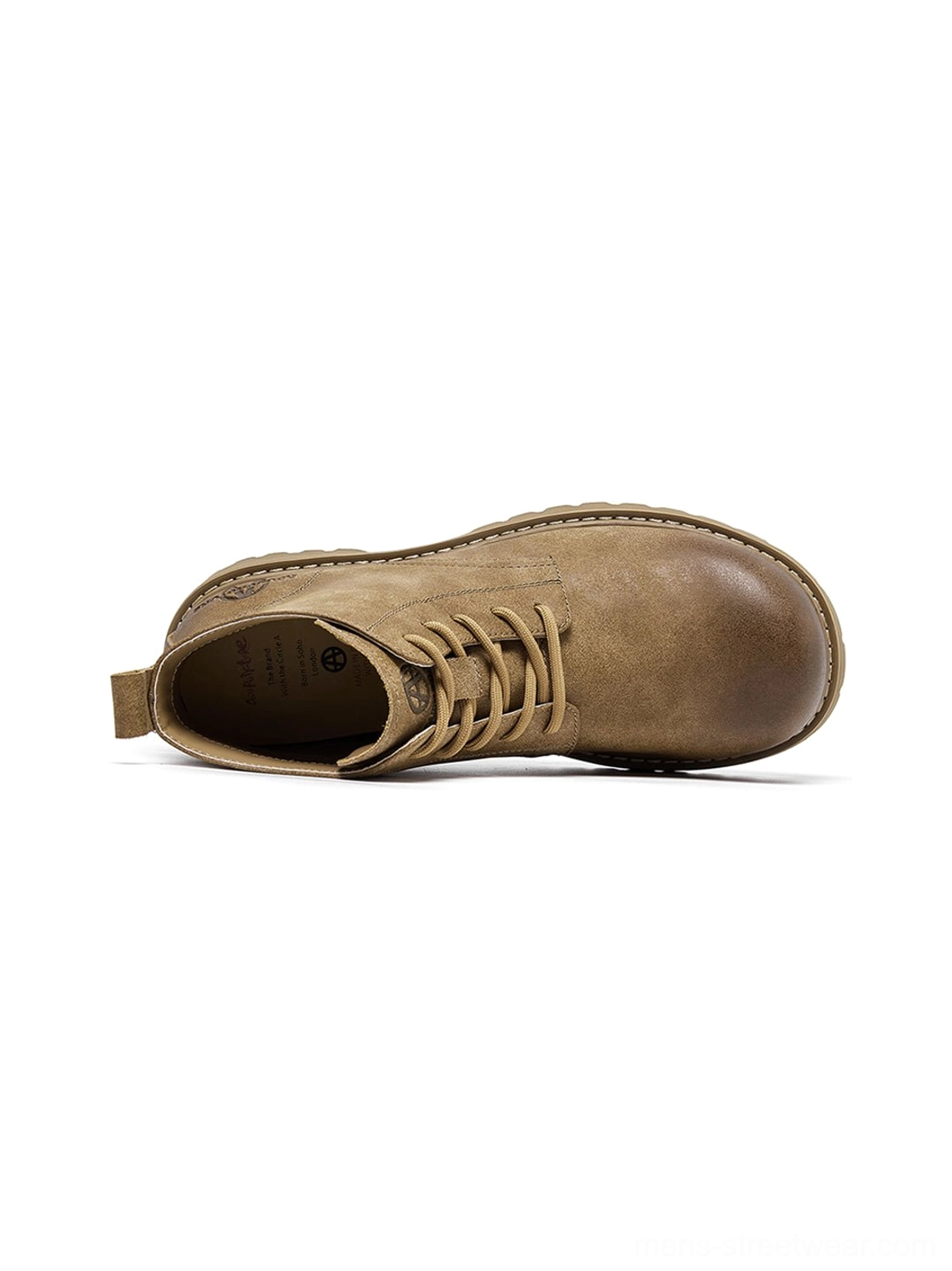 Tan lug-sole boots for Korean fashion outfits featuring a substantial workwear-inspired profile