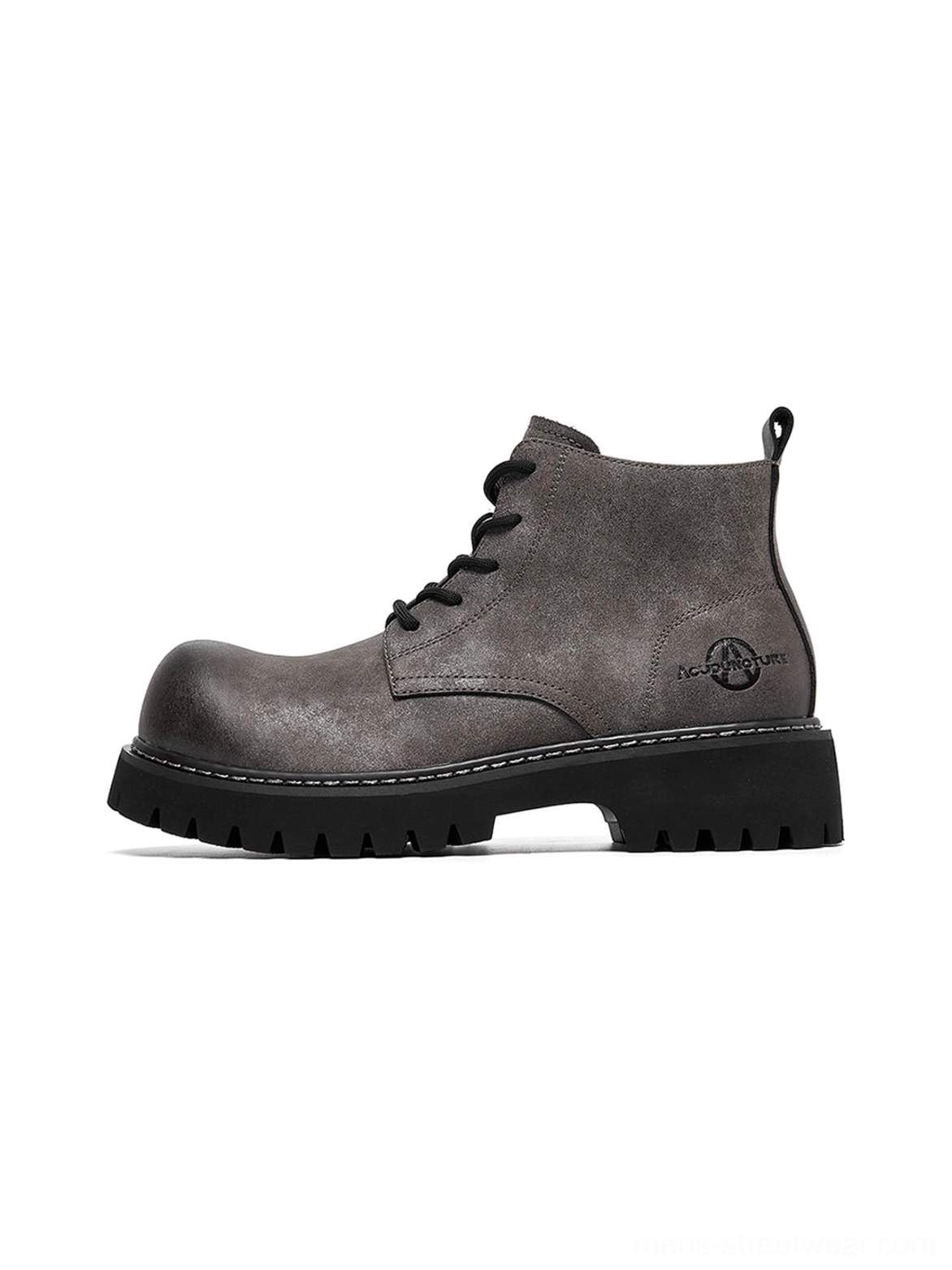 Tan round-toe work boots with chunky outsole and workwear-inspired construction for everyday city wear
