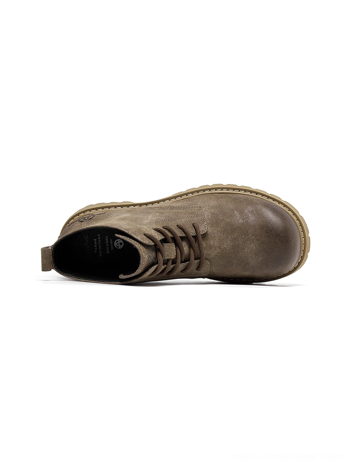 Tan rugged work boots with lace-up front and thick outsole for modern utility fashion wardrobes