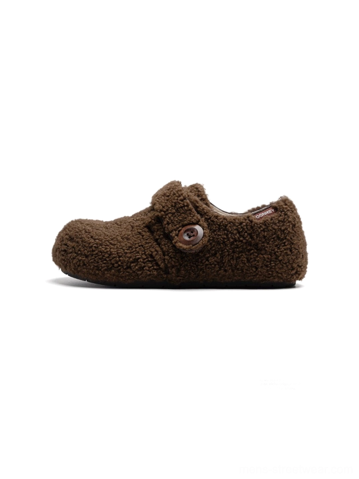 Tan teddy fleece Velcro slip-on shoes with plush texture and rounded low-profile sole