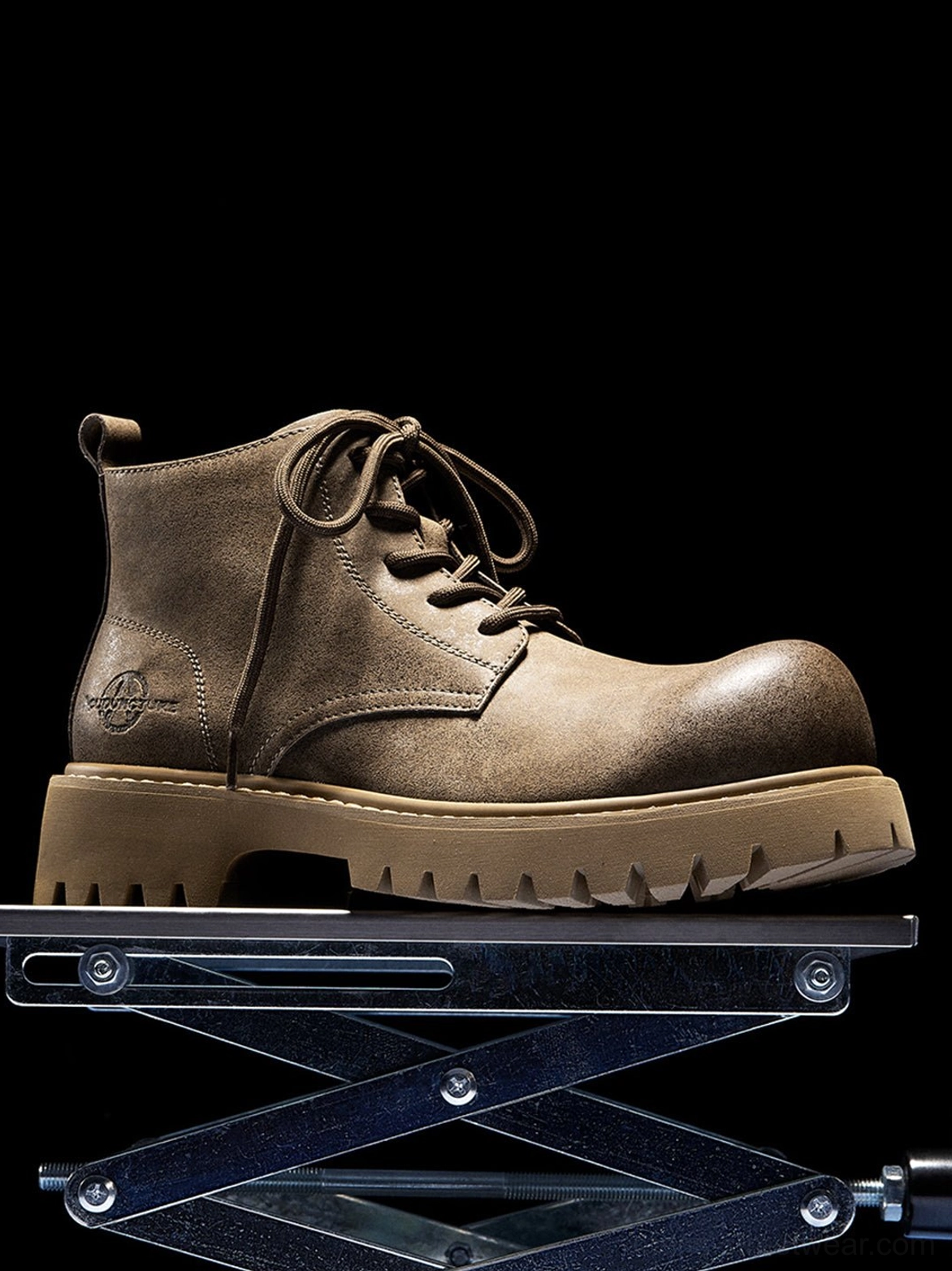 Tan urban work boots with distressed upper and chunky outsole for contemporary Asian street fashion