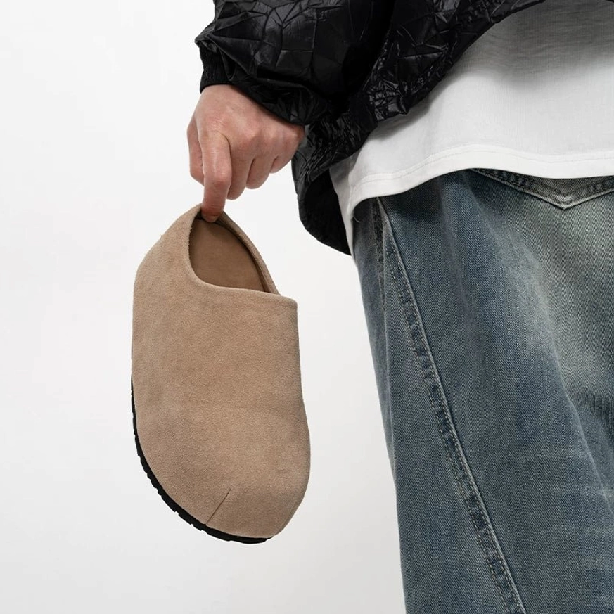 Taupe beige suede box toe clog shown from the front side with a clean slip-on design and rounded closed toe