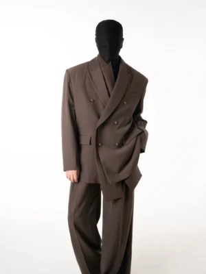 Taupe brown double-breasted streetwear suit with structured blazer and matching wide-leg trousers shown from a three-quarter front view