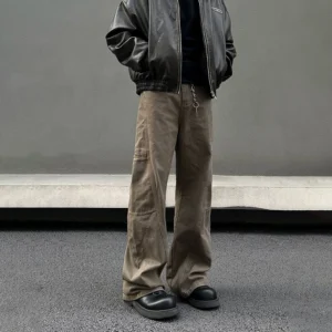 Taupe wide-leg utility cargo pants rear three-quarter view with side pocket and metal drawcord streetwear styling