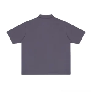 Back flat lay of a dark grey short sleeve technical polo shirt showing the clean seamless back and relaxed boxy streetwear silhouette