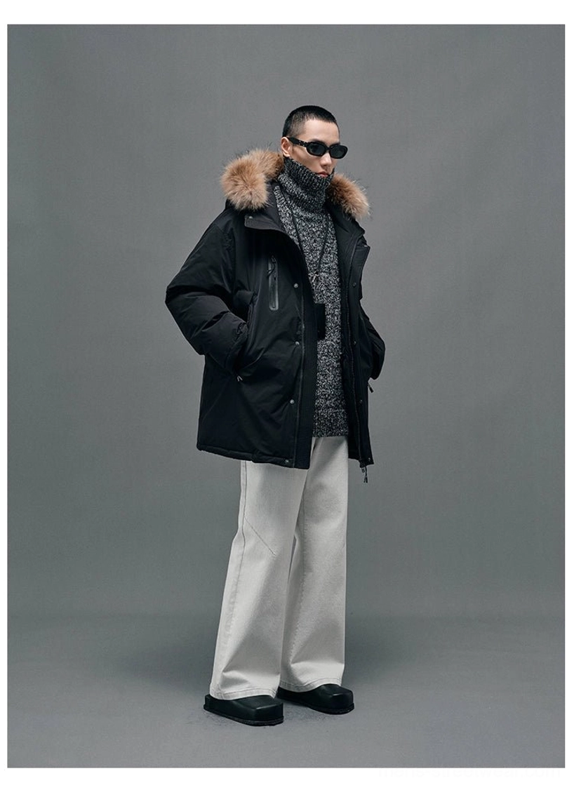 Contemporary techwear inspired hooded down coat with contrast zipper details, warm duck down filling and utility styling