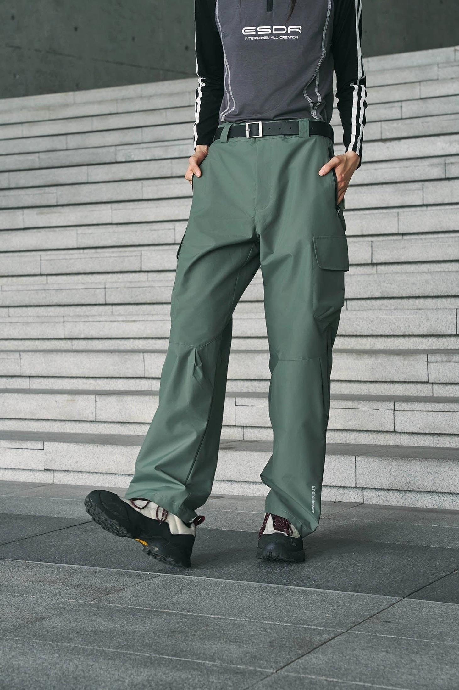 Techwear waterproof cargo pants product image showing the functional streetwear silhouette and utility pocket design