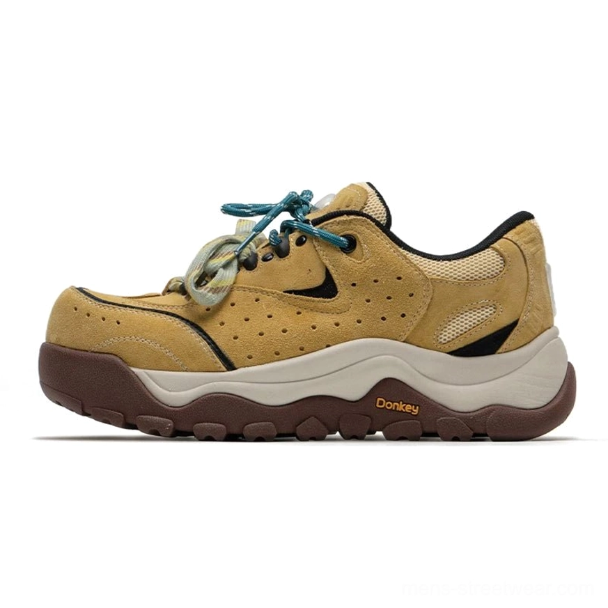 Yellow brown Terrain Crest chunky trail sneakers shown in side profile with suede-like mesh upper, dual color laces, layered overlays, and rugged rubber outsole