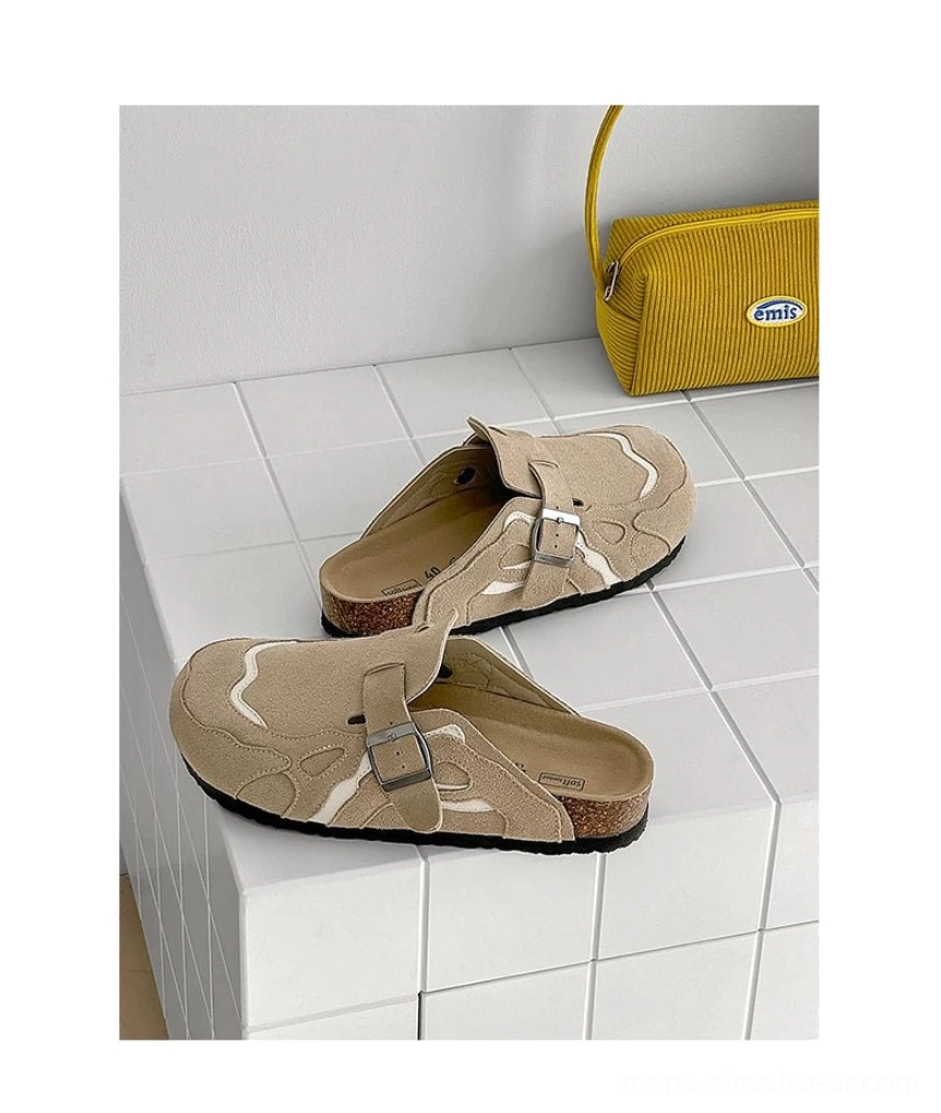 Textured cow suede clogs with exposed contoured footbed, thick sole, and understated East Asian fashion styling