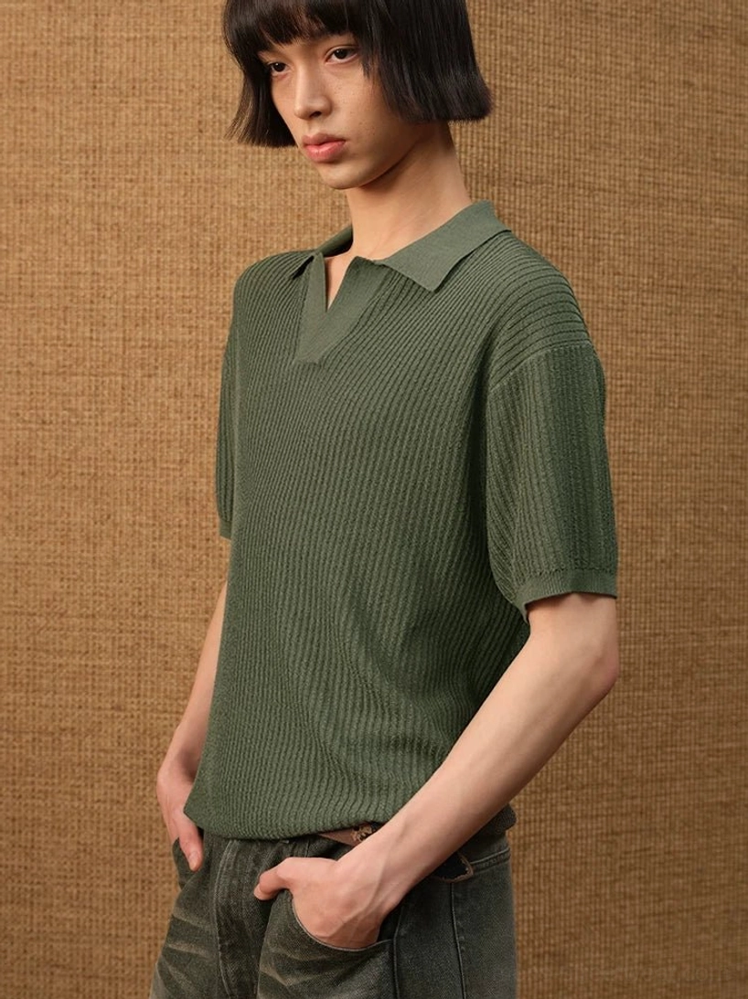 Olive green textured ribbed knit open-collar polo shirt shown in a side close-up with short sleeves and vertical knit texture