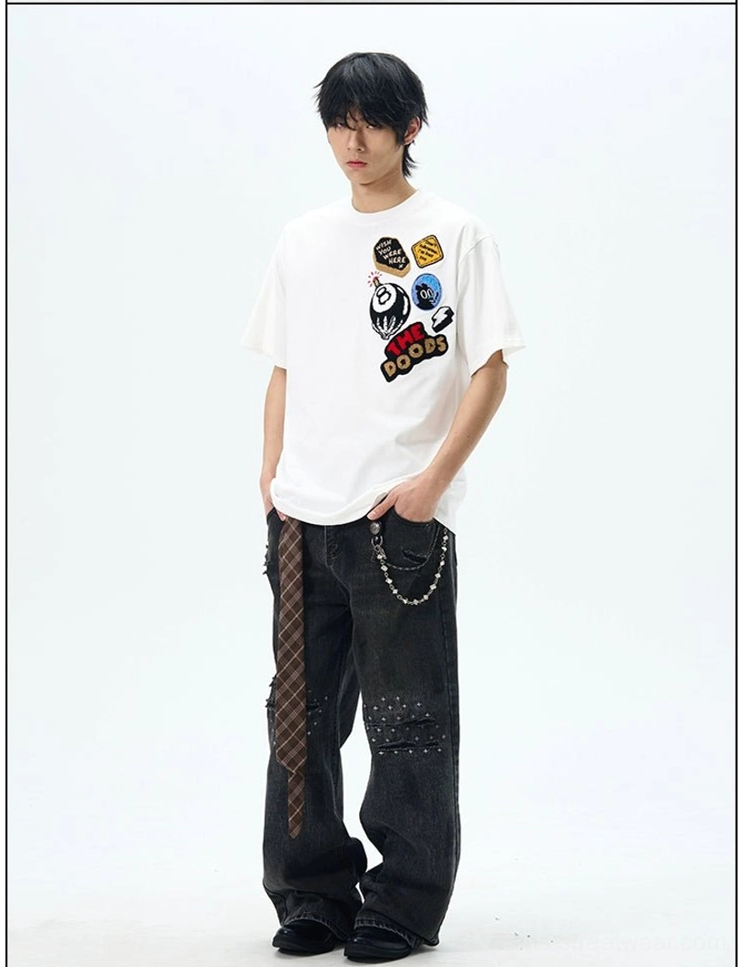White THE DOODS oversized streetwear T-shirt showing 8-ball embroidered patch and retro chest graphics