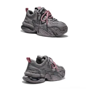 Titan Orbit chunky retro streetwear sneakers dark grey front three-quarter view with layered mixed-material upper