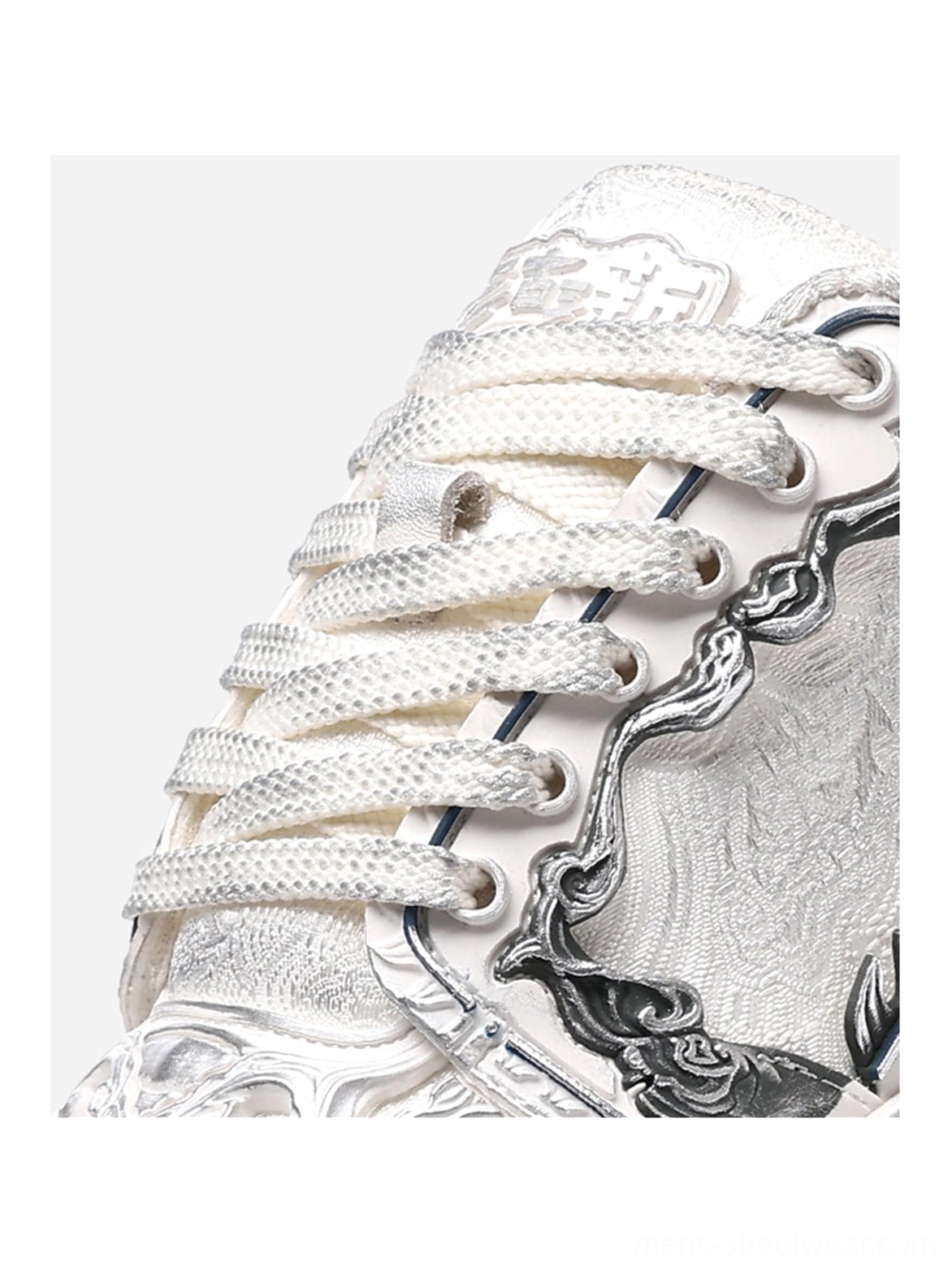 Tonal white Wukong-inspired streetwear sneakers designed with dimensional upper details and a bold wave platform outsole