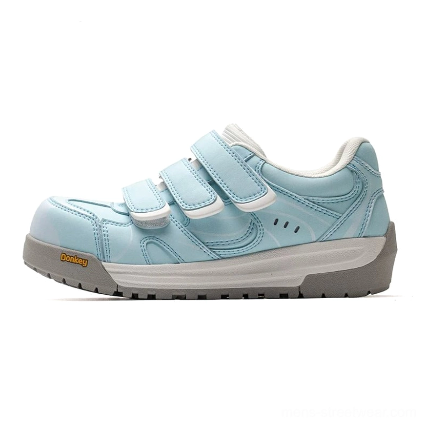 Baby blue triple strap platform sneakers with adjustable Velcro closures and contemporary casual streetwear design