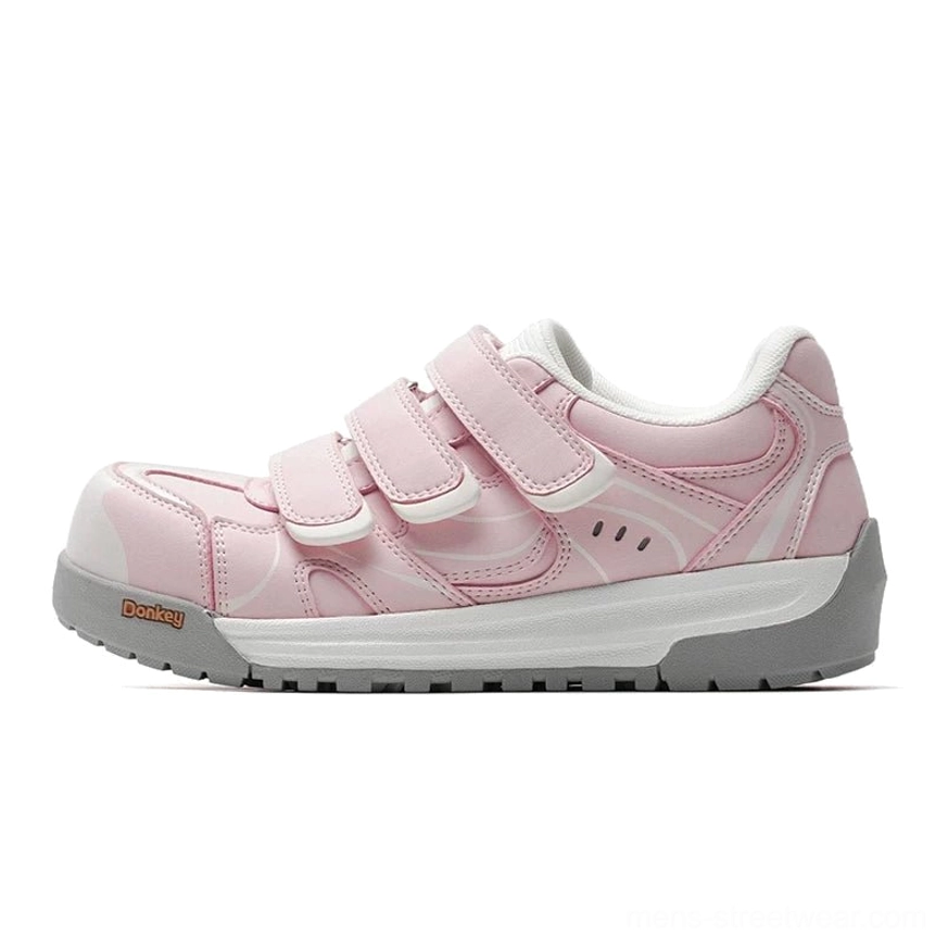 Pink triple strap platform sneakers with smooth upper, rounded toe, white midsole, and adjustable Velcro closures