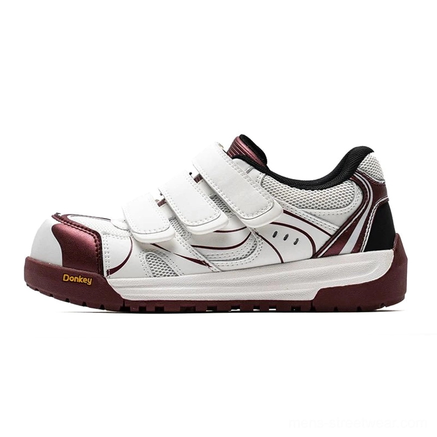 White and red triple strap platform sneakers with adjustable hook-and-loop straps and bold color-blocked styling