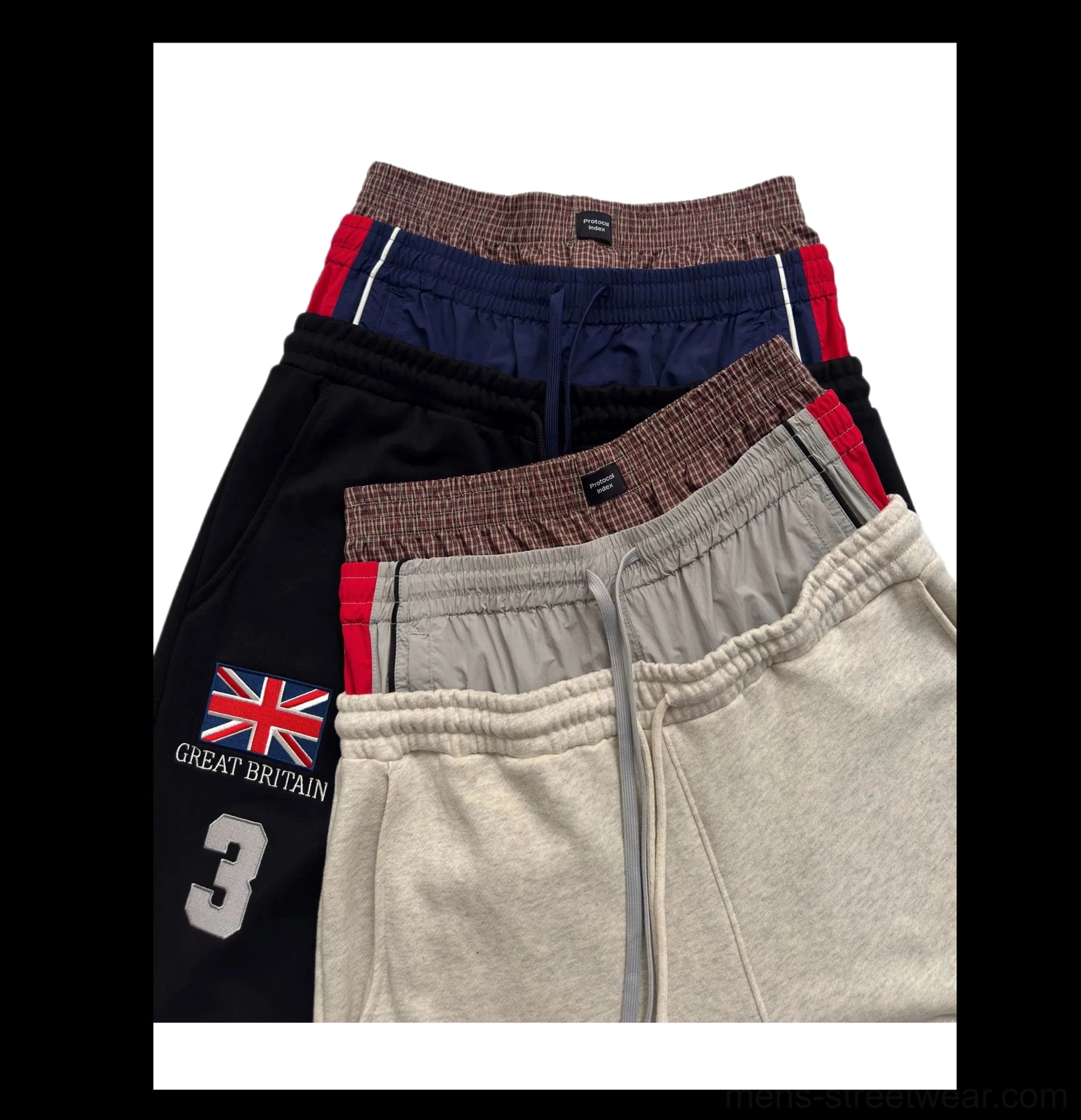 Triple waist puddle track flares in black navy and apricot showing layered elastic waistbands and oversized wide legs