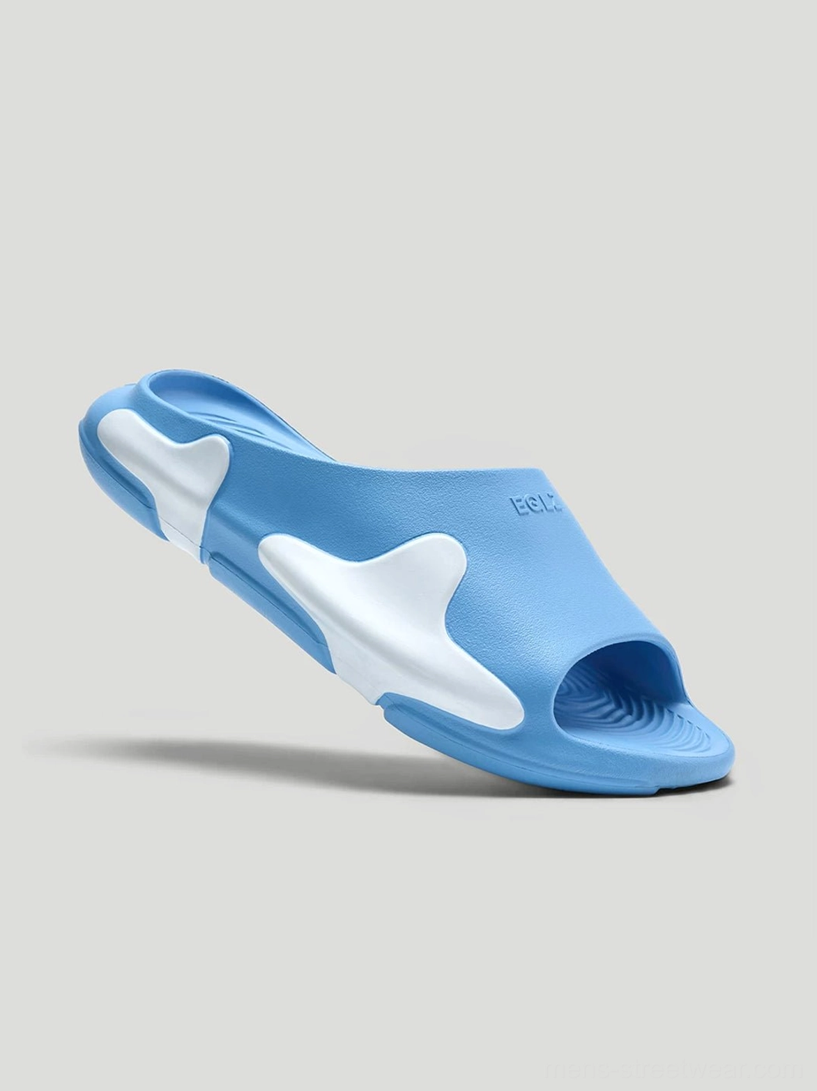 Two-tone blue open-toe slip-on slides with white heel accents and sculpted streetwear upper