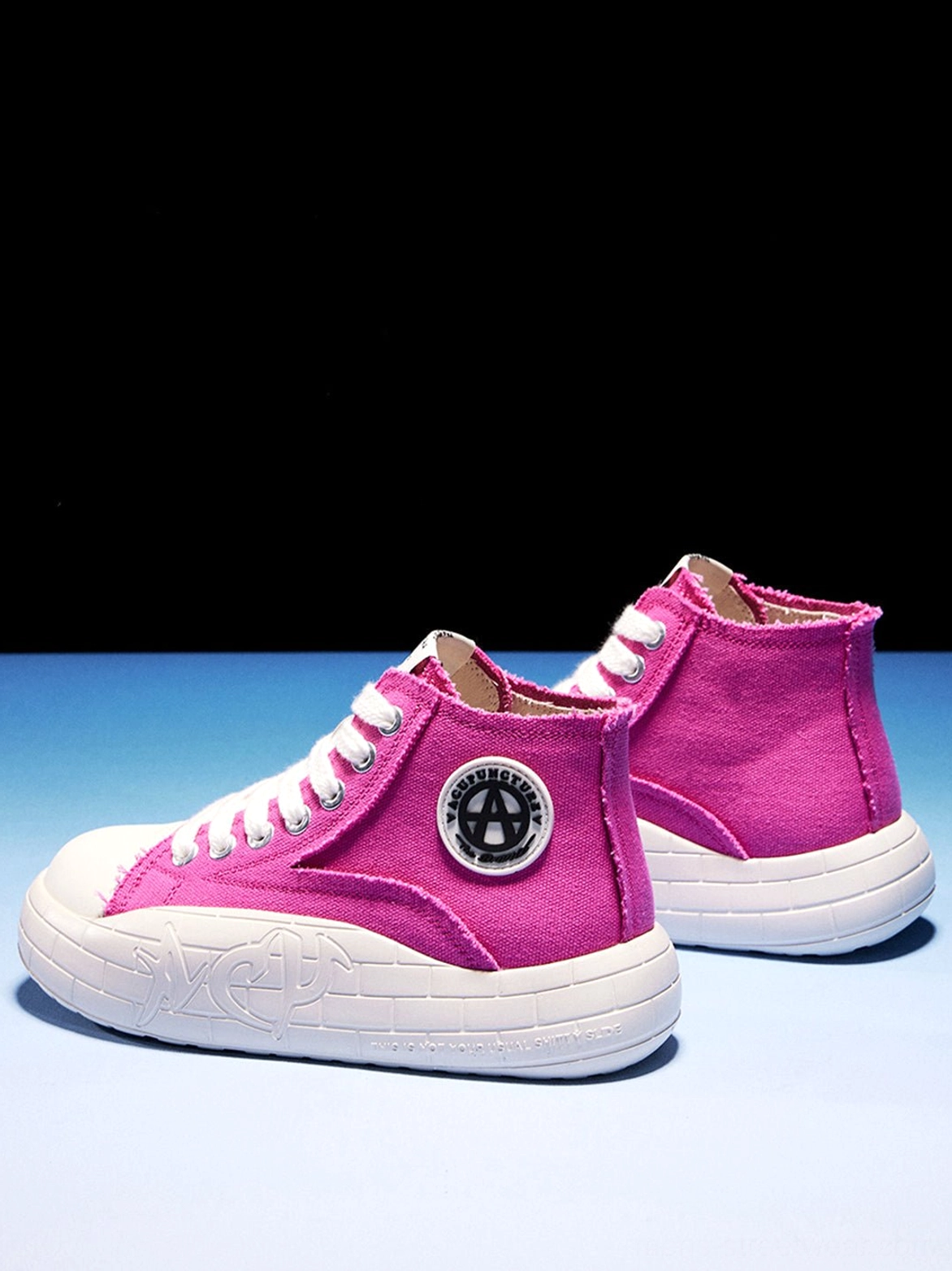 Unisex canvas high-top platform sneakers with a bold two-tone upper for modern street style