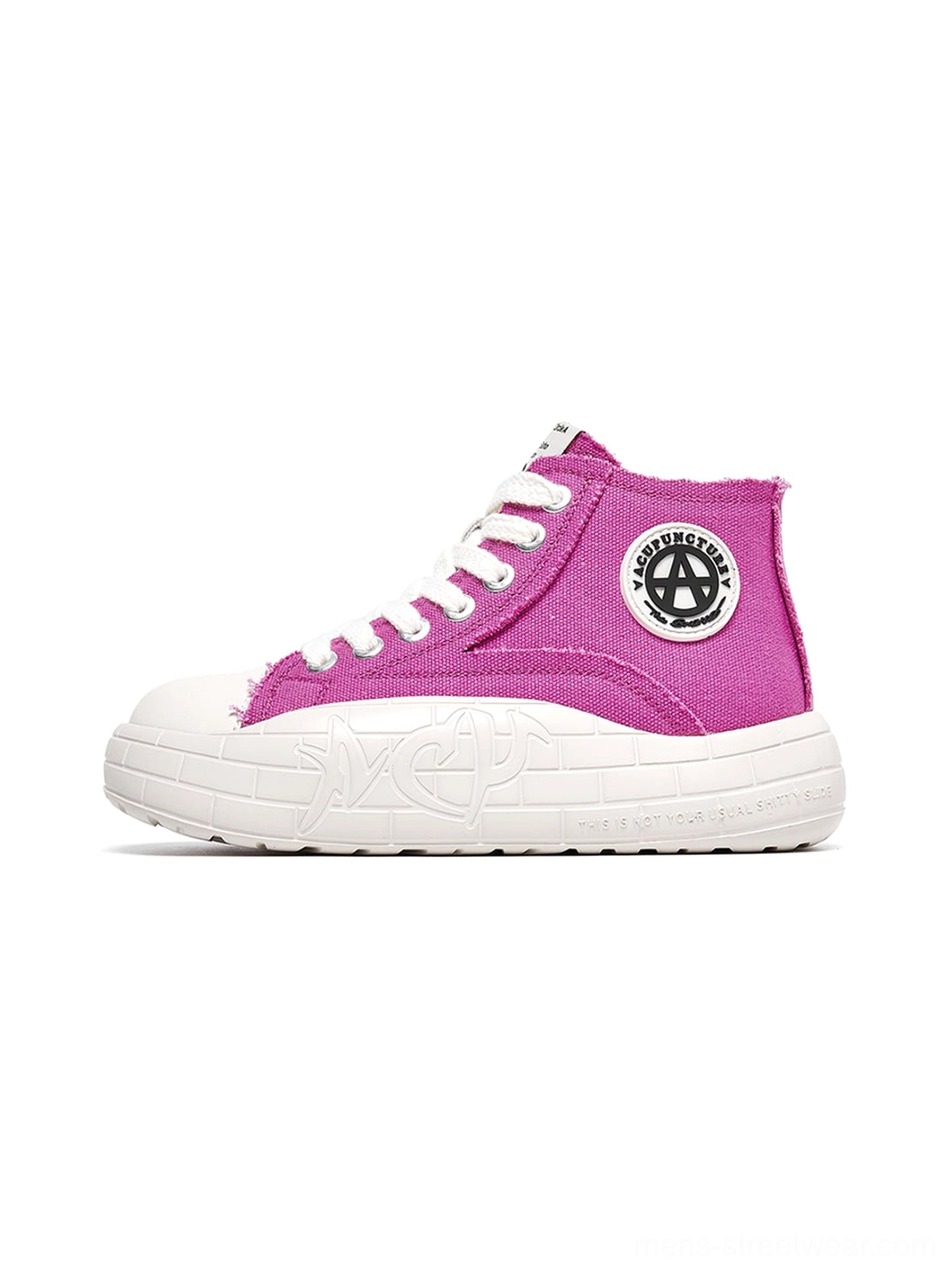 Red two-tone canvas high-top platform sneakers with lace-up design and bold streetwear proportions