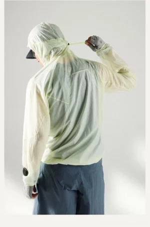 Rear full-body view of the ultra-light Lemon Green UPF 50+ windproof hooded sun protection jacket with crinkled fabric and thumbhole cuffs