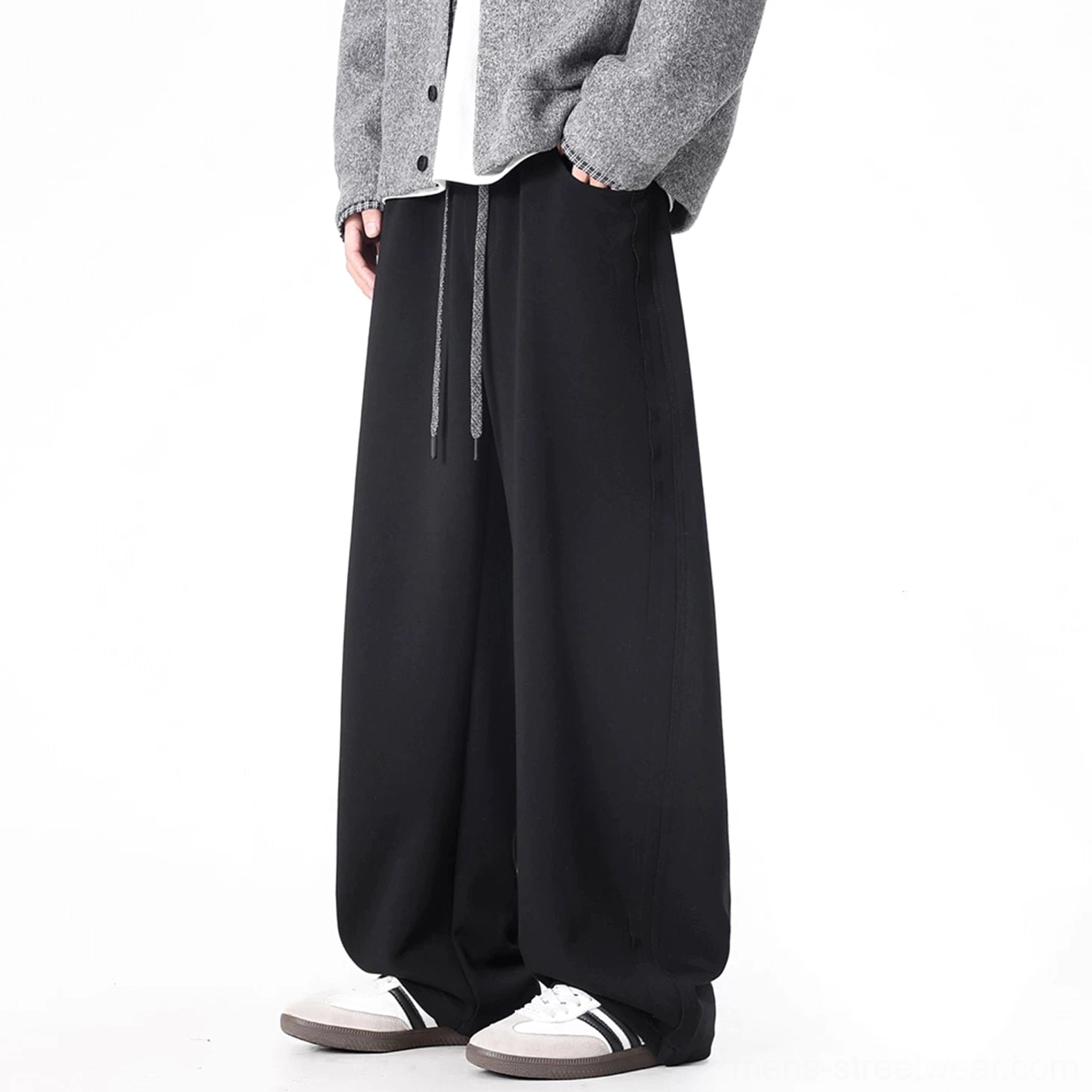 Black ultra-wide drawstring sweatpants with long relaxed legs for Seoul streetwear outfits