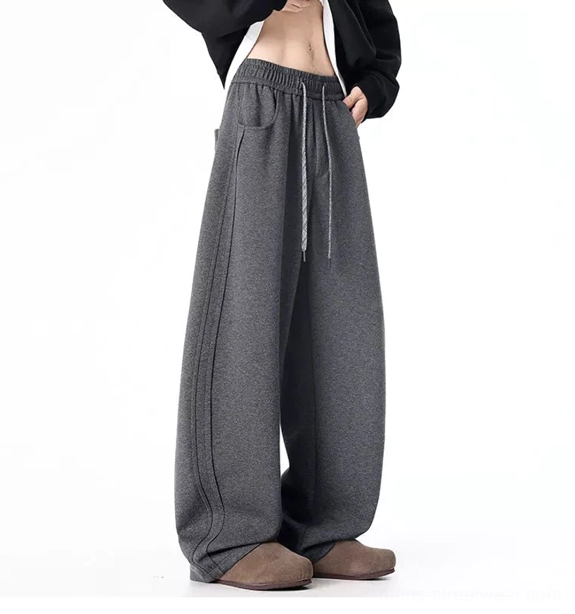 Dark gray ultra-wide drawstring sweatpants rear side view showing back pocket detail