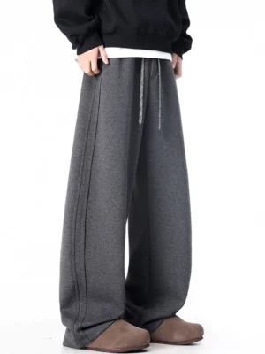Dark gray ultra-wide drawstring sweatpants front view with long Korean streetwear wide-leg silhouette