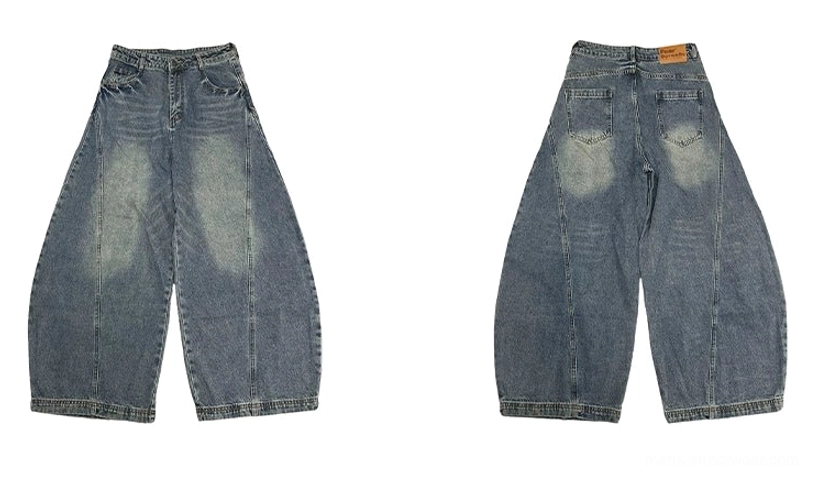 Flat lay front and back view of blue ultra wide-leg balloon jeans with classic pockets and vintage wash