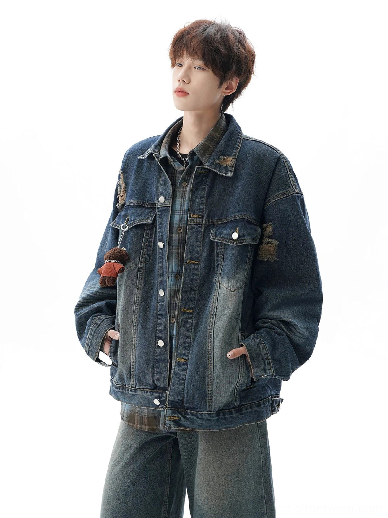 Unisex oversized denim jacket with worn-in vintage fading, panelled construction, metal-style buttons, and casual East Asian streetwear appeal