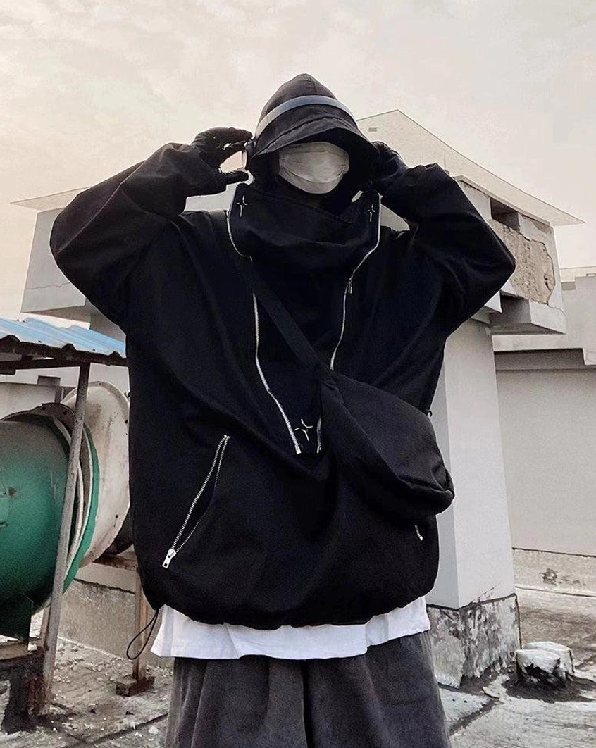 Urban tactical hooded outerwear with drop shoulders, structured high neck, zipper accents, and flexible oversized styling