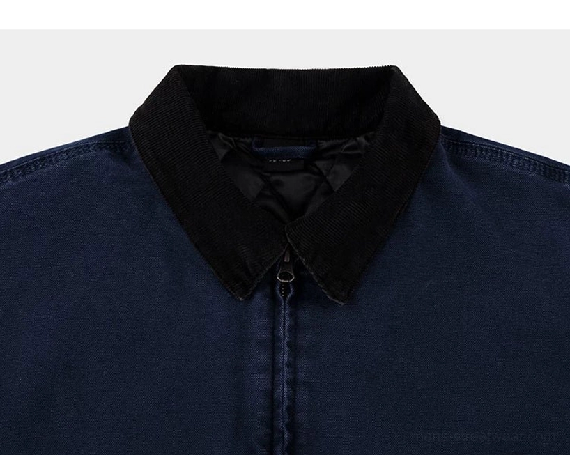 Utility inspired street jacket with boxy shoulders, cotton canvas fabric, quilted lining, and practical button cuffs