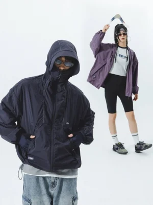 Dark navy UV-protective techwear hooded windbreaker shown on models with a face-covering hood, full zipper and relaxed streetwear fit