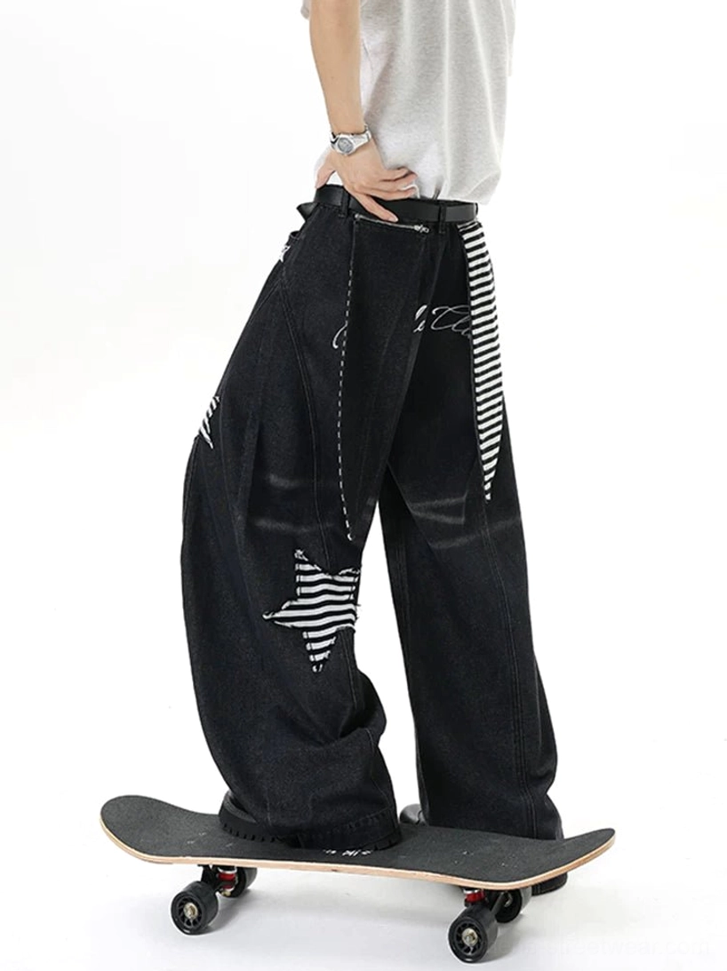 Skate style outfit featuring vintage washed black wide leg balloon jeans with striped stars and a hanging waist strap