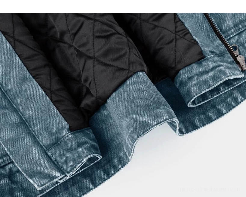 Two-tone utility jacket with vintage-inspired corduroy collar, cotton canvas body, and modern oversized streetwear proportions