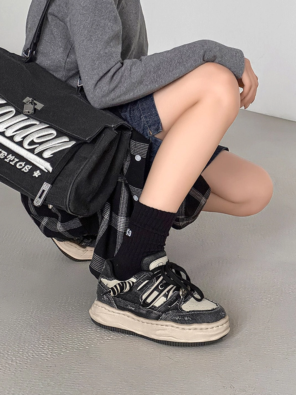 Vintage denim-effect platform sneakers with relaxed proportions and distinctive distressed texture for Seoul-inspired outfits