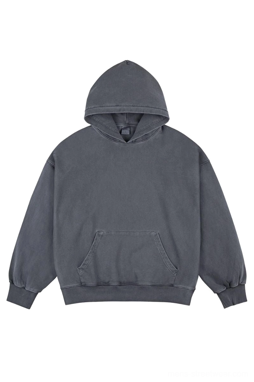 Dark charcoal gray vintage faded wash oversized cotton hoodie front flat lay with kangaroo pocket and ribbed cuffs