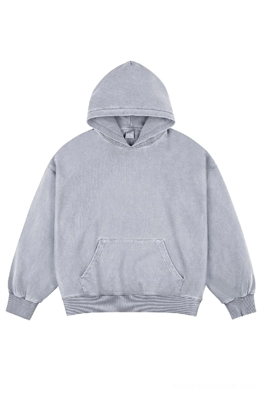 Light blue faded wash oversized unisex cotton hoodie front flat lay with hood ribbed cuffs and pocket