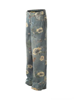 Side flat lay view of washed blue floral print wide-leg denim jeans with back pocket detail