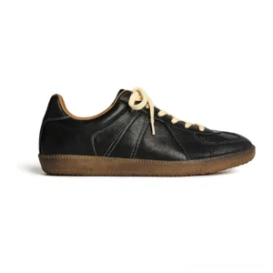 Black vintage leather German Army Trainer sneakers with contrast stitching off-white laces and tan gum rubber outsole