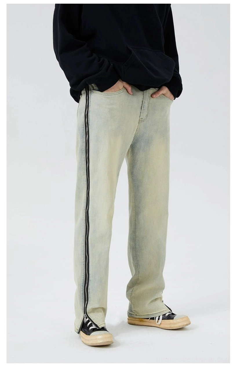 Vintage light-wash straight-leg jeans featuring a contrasting black vertical side stripe for modern streetwear styling