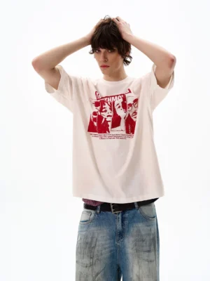 Off-white vintage portrait graphic oversized streetwear t-shirt front view with wide-leg jeans