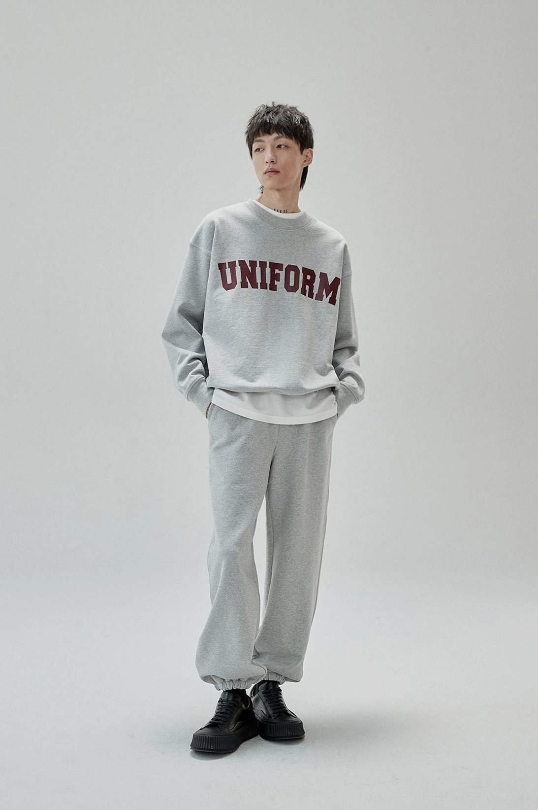Vintage varsity-style UNIFORM print crewneck sweatshirt for casual daily outfits