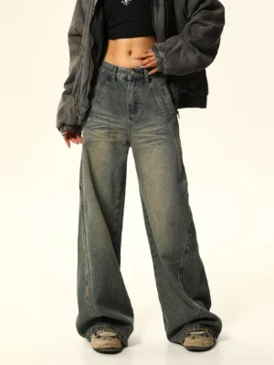 Front view of vintage washed blue wide-leg carpenter jeans with high waist and relaxed streetwear silhouette